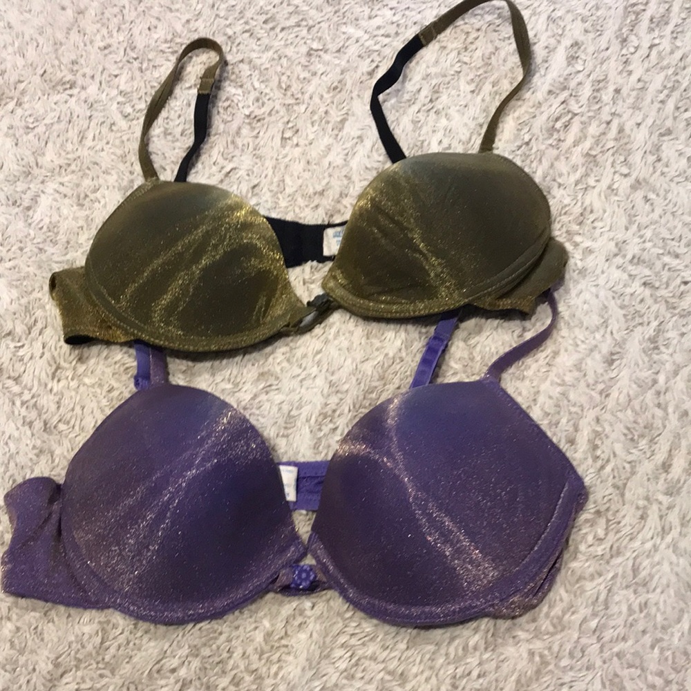 2 Beautiful Lily of France bras size 36 B. They have slight padding.